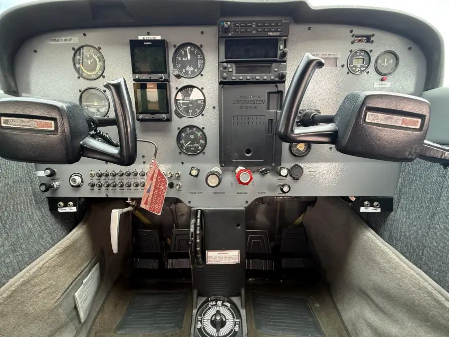 Analog cockpit instrument panel of a small aircraft