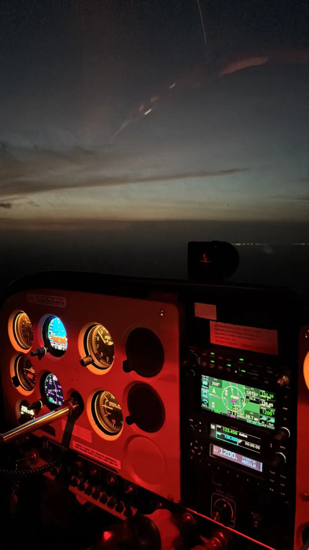 Illuminated aircraft cockpit panel at night